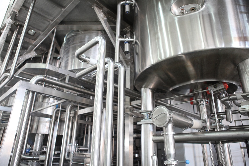 stainless steel tubing and tanks in manufacturing facility
